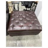 Brown leather ottoman