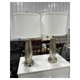 Pair of gold tone glass table lamps with white