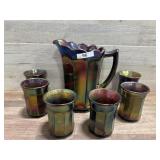 Carnival glass pitcher with 6 glasses