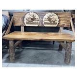 Custom built log leg bench with Elk designs on