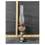 Antique oil lamp on marble base