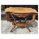 Antique lamp table with squirrel in base