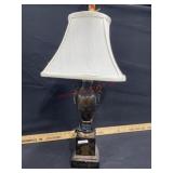 Empire style urn table lamp  with cream shade