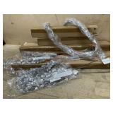 65 Boxes of Silver tree picks and garland