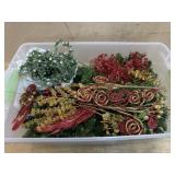 Tote of red and green picks/ garland and florals