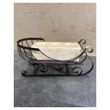 Metal sleigh with candle