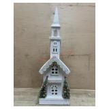 Illuminated Wooden church with glitter