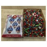 Colorful Santa and tree garland and box of