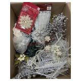Box of icicle ornaments and decorator picks