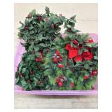 Tote of Holly garland and greenery garlands