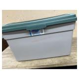 Tote of holiday greenery and florals