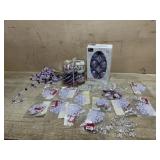 Box lot of purple ornaments and snow flake