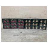 6- Boxes of red and gold bell ornaments
