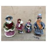 Set of 4 paper mache carolers