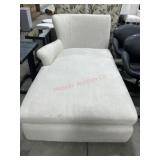 White upholstered lounge chair