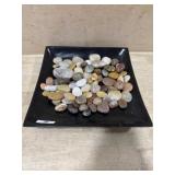 Decorative black plate with stones