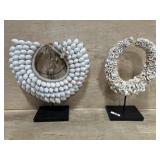 2- Decorative shell necklaces on stands
