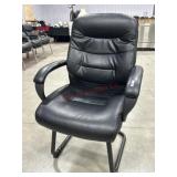 Black faux leather office guest chair with sled