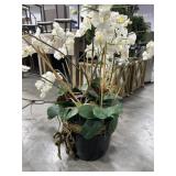 Artificial lily plant in heavy pot