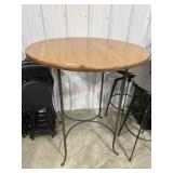 Wrought iron and wood bar height table