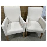 2- Magnussen Home white upholstered arm dining