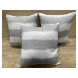3- Grey and white throw pillows