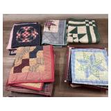 Flat of quilted pot holders and lap blankets
