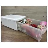 Tote of doll head ornaments