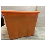 Orange tote of silk flowers and vases