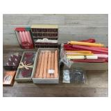 Box of taper and votive candles