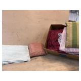 Box lot with pilloiws. rag rug and misc.