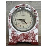 Red and white ceramic table clock