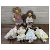 Flat of porcelain dolls and rag doll