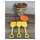 Vintage sand pail and shovels