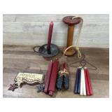 Flat of candles and wood spool