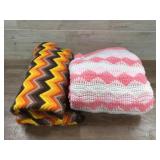 Pink and gold afghans