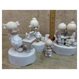 3- Precious Moments music boxes and one figurine