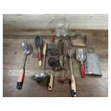 Flat of old kitchen utensils
