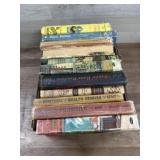 Flat of old books Huck Finn, Happy Hours reader