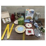 Box lot with cookie press, candle, curling iron