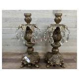 Pair of gold tone candle sticks with prisms