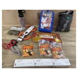 Tote of spray. Poncho. Frog toggs. Toe warmer.