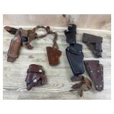 Flat of leather holsters