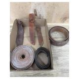 Flat of 3 leather sheaths and leather bands