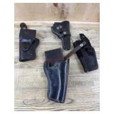 Flat of leather and synthetic holsters