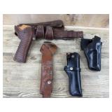 Four leather holsters