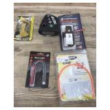 Flat of gun plugs. Pepper spray. Bore light. Hi