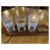 Samual Adamï¿½s serving paddle with glasses