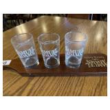 Samual Adamï¿½s serving paddle with glasses