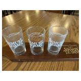 Samual Adamï¿½s serving paddle with glasses